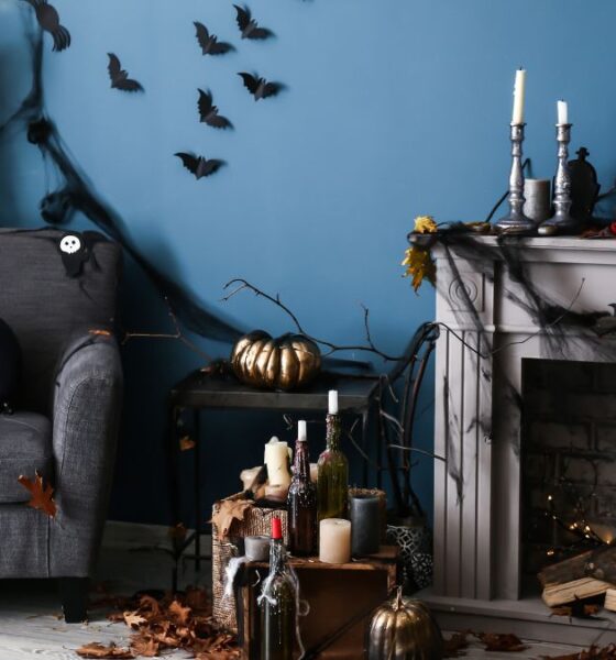 Chair and mantle setting with Halloween decor